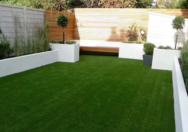 Artificial lawn & rendered beds